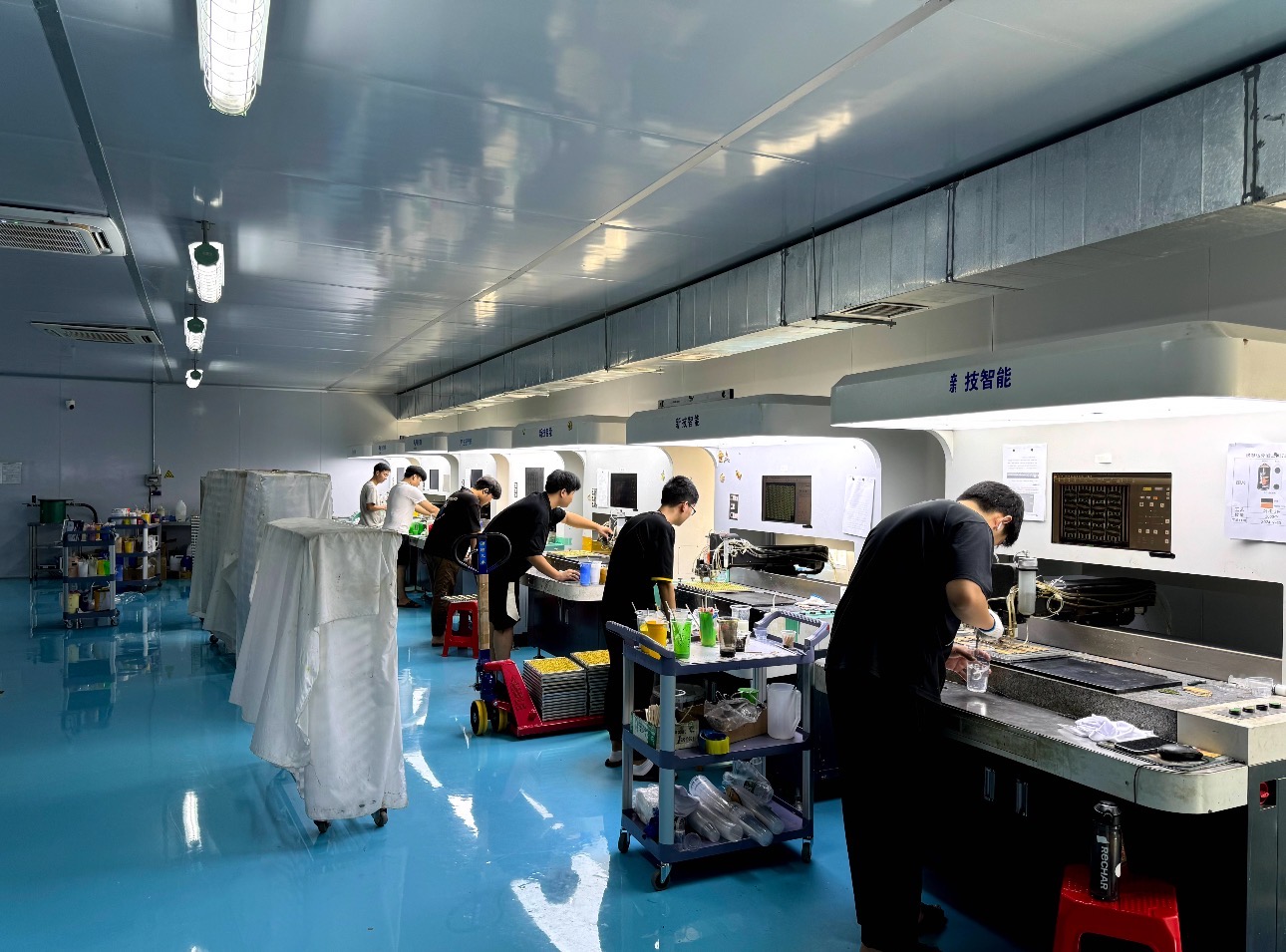 WJR Crafts workshop with operators working at production stations